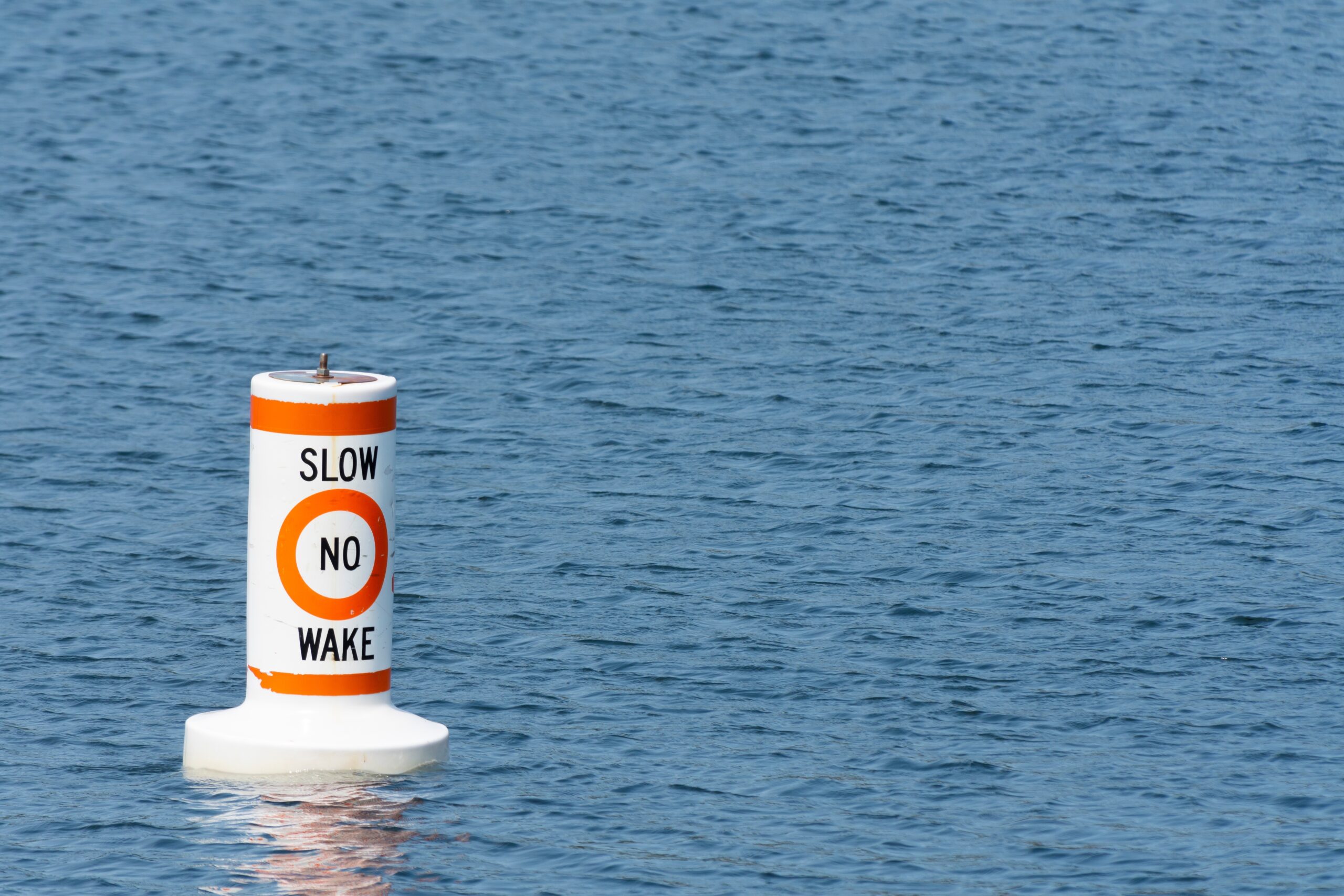 An,Image,Of,A,Single,Red,And,White,Warning,Buoy